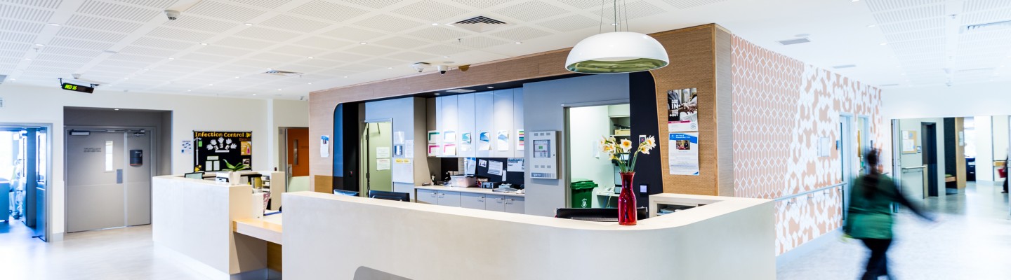 A long shot of the Werribee Mercy Hospital reception desk.