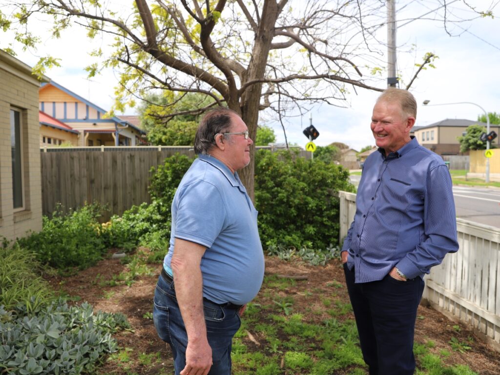 Mercy Palliative Care volunteer Brian Young (right) with patient Allan Howlett (left) at Allan’s home in Werribee.
